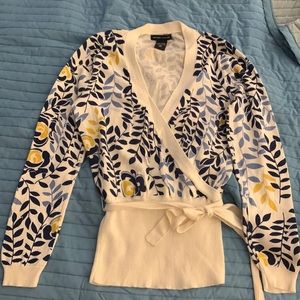 Navy, gold and white floral print faux wrap sweater